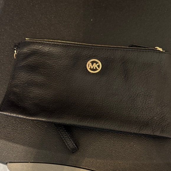 Michael Kors Handbags - Michael Kors Black Wristlet with Gold Logo